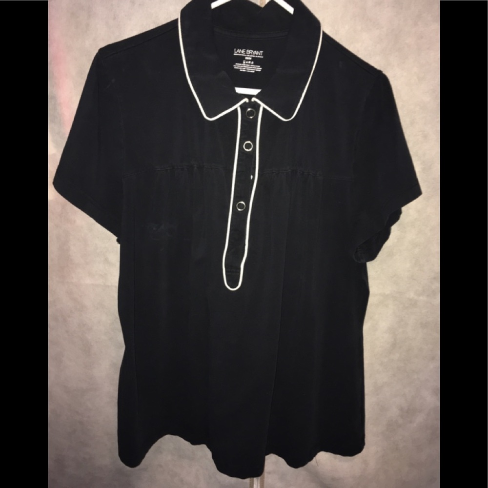 Buttoned, collared navy blue shirt.